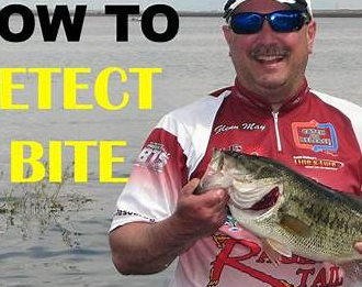angler showing a large bass caught after proper hook set and retrieve technique